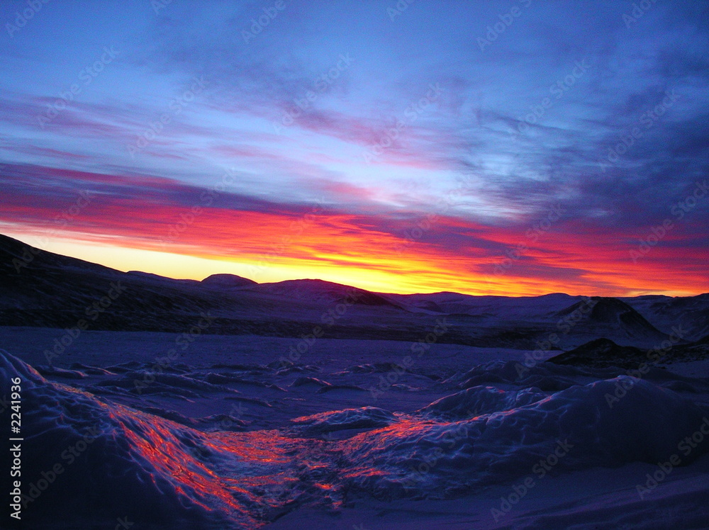 sunrise above ice mountains of altai