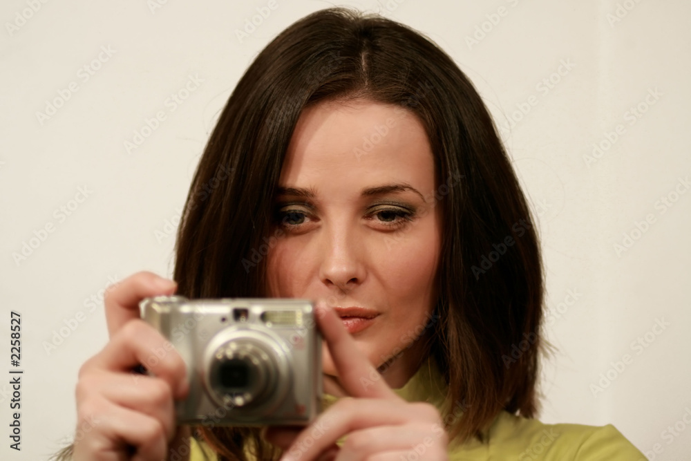 lady holding a camera lady holding a camera
