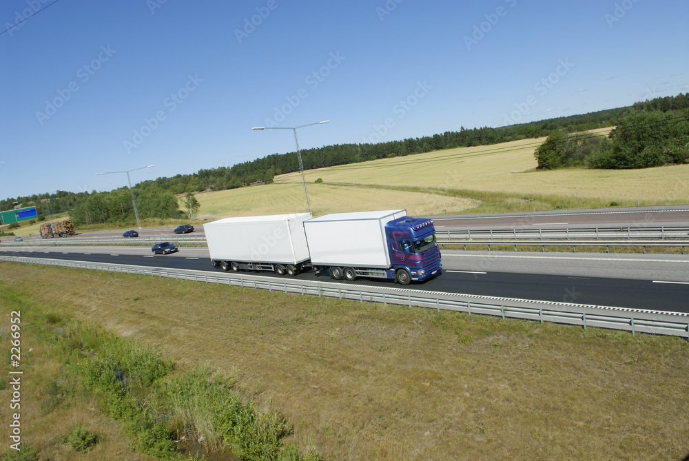 large truck on highway large truck on highway