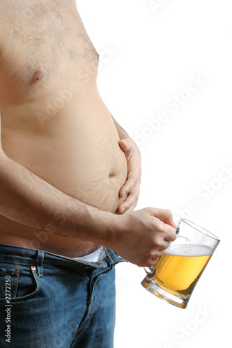 fat man holding his beer belly