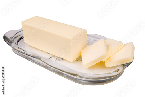 sliced butter on a glass dish