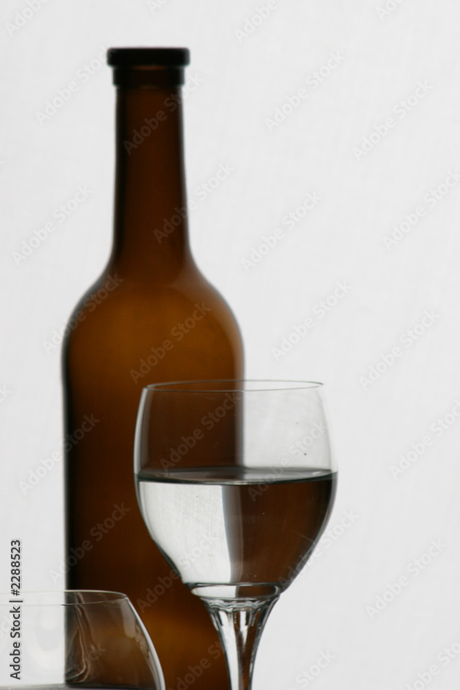 brown bottle and glasses