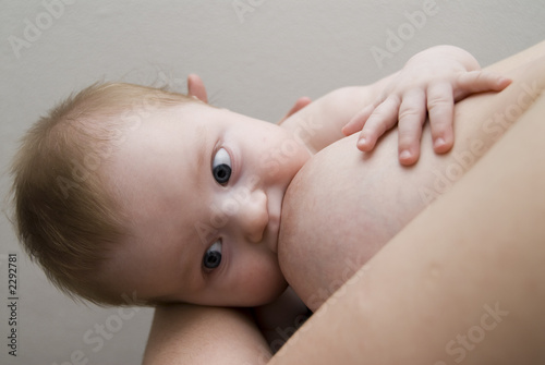 breast feeding of the newborn baby.