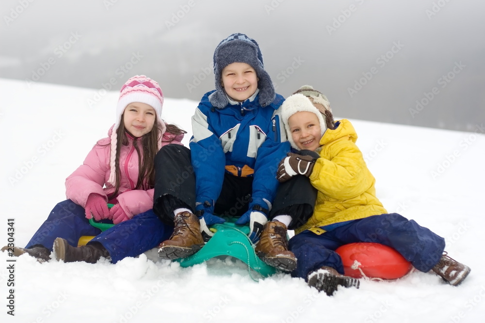 kids playing in fresh snow