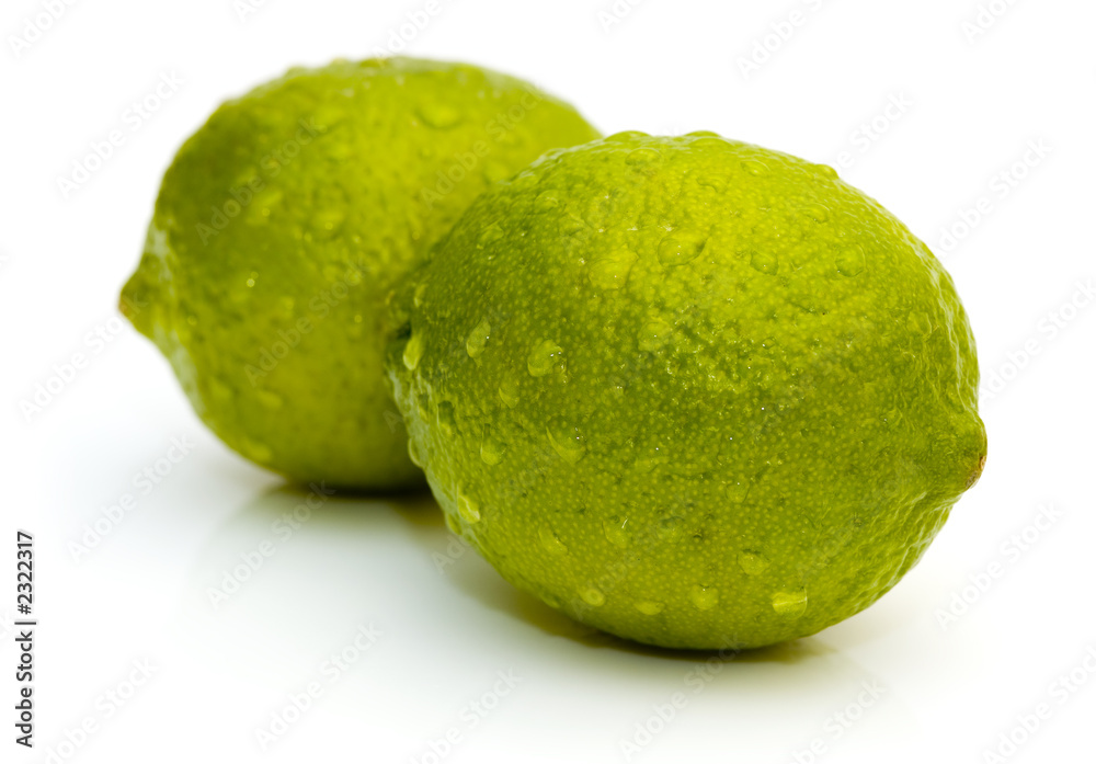 lime with water drops isolated on white background lime with water drops isolated on white background