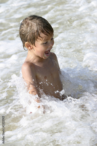 playing in the waves