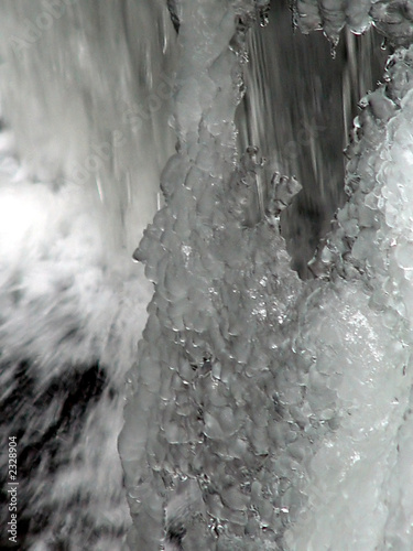 abstract snow and ice over flowing waterfall