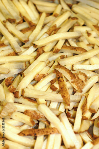 a group of raw french fries