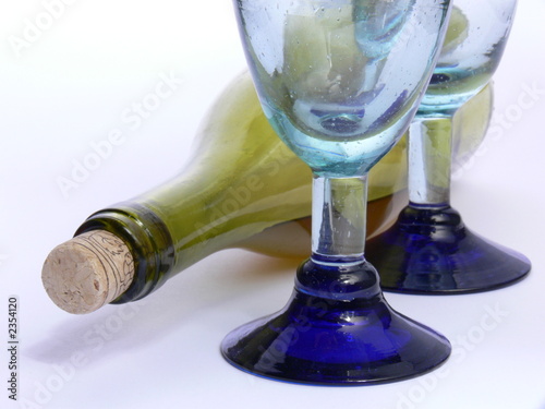 bottle and two drinking glasses