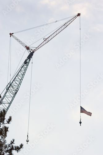 old glory and a tall crane