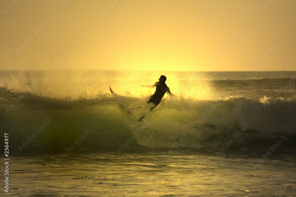 sunset surfer falling