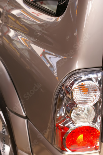 Car hedlight close-up. Turn, stop and reverse signals.