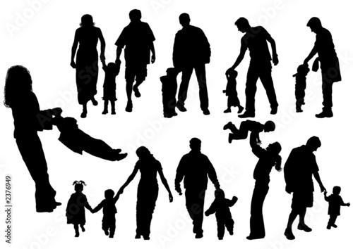silhouettes of parents with baby