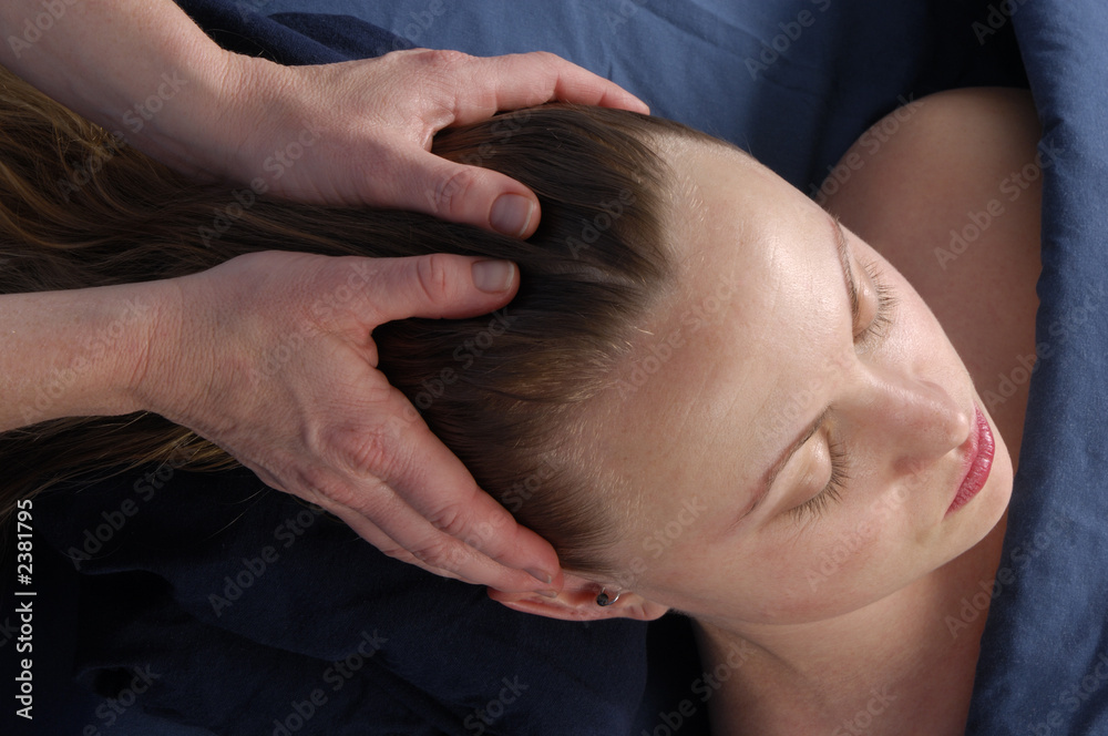 massaging head and scalp at wellness center massaging head and scalp at wellness center