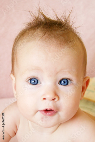 baby girl with hair stuck up