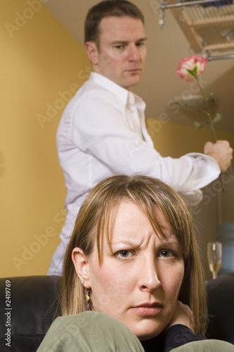 couple arguing in apartment