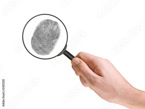 fingerprint and magnifying glass in hand