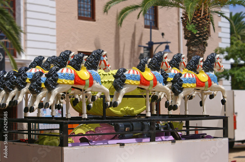 carousel horses in formation