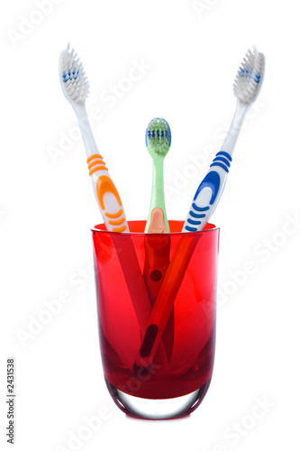 family tree toothbrush in red glass