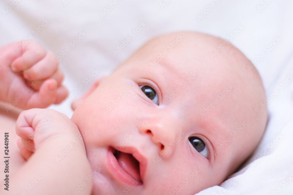 little baby dream. head with arms close-up