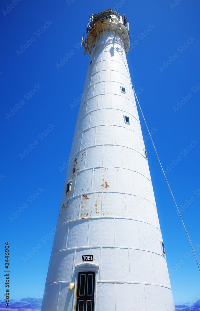 lighthouse against blue sky