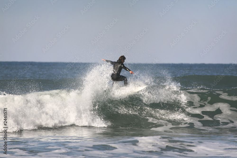 surfer on top of the wave