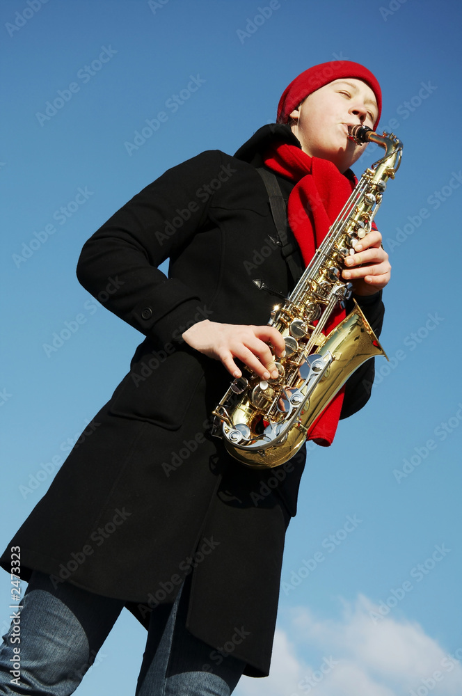 Naklejka premium girl with saxophone