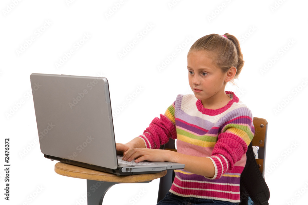 young female student working on laptop computer young female student working on laptop computer
