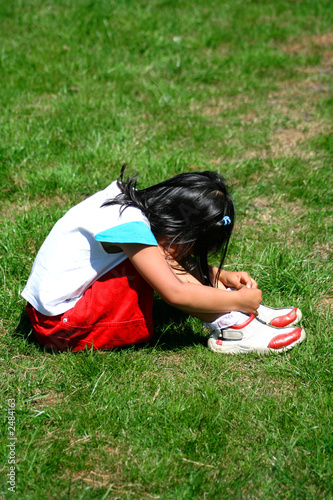 Obraz na plátne a young girl sulking after being told off.