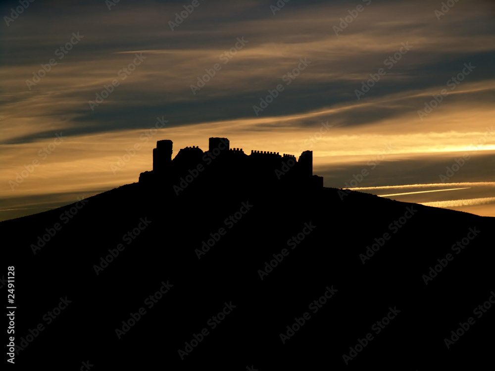 castle silhouette at sunset