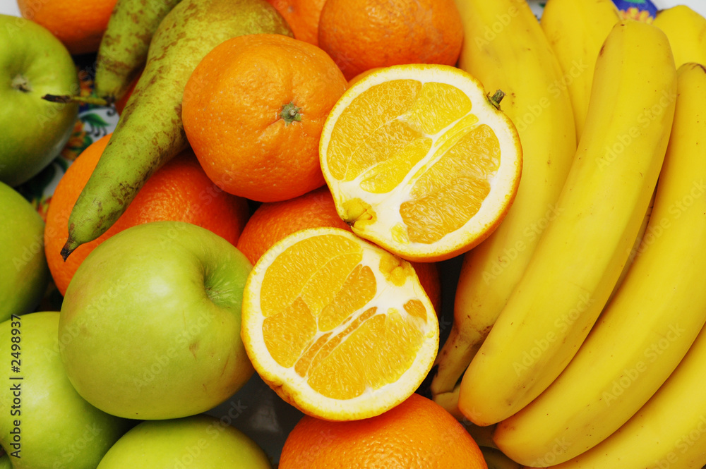 apples, orange and bananas at the market stand apples, orange and bananas at the market stand