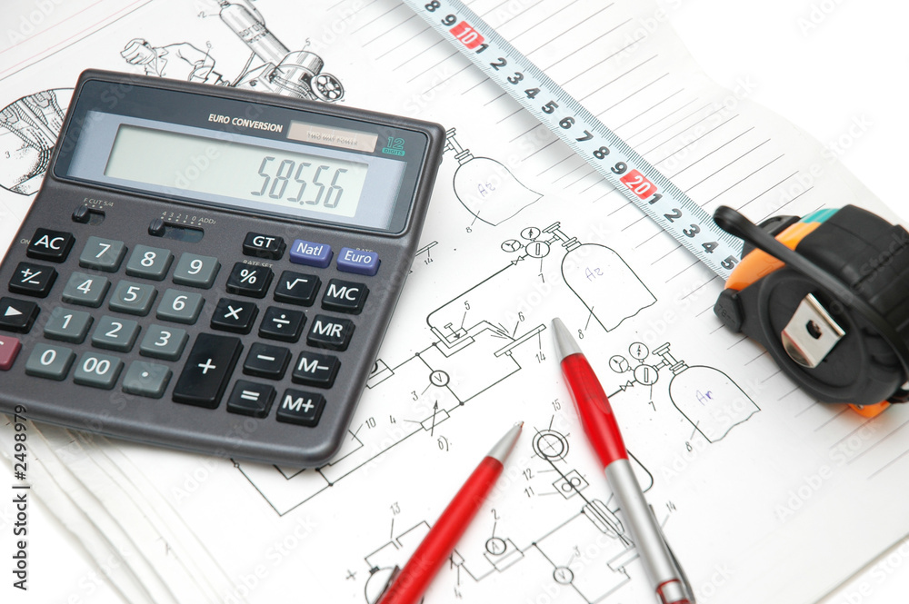 design drawings, calculator, pens and measuring tape design drawings, calculator, pens and measuring tape
