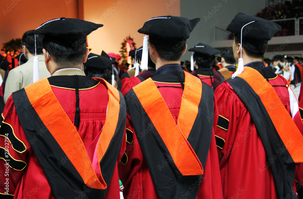 three asian university graduates