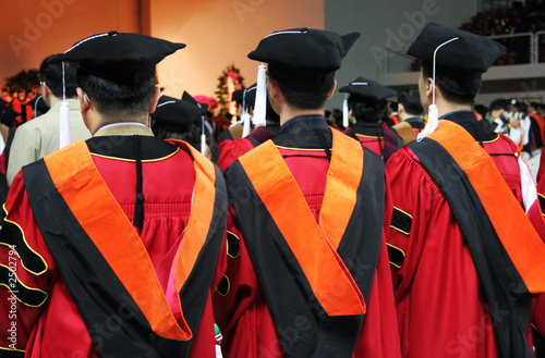 three asian university graduates photo