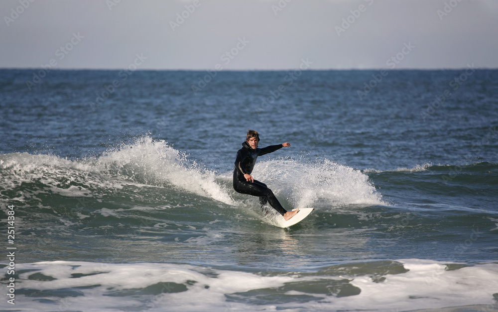 surfer making a forehand