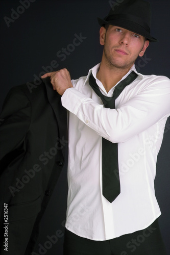 man in hat and suit