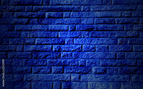 blue stone wall background with highlighted center