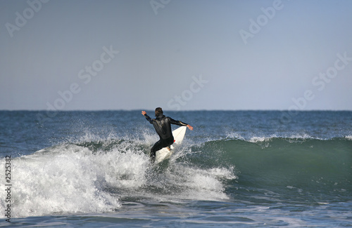 surfer on top of the wave