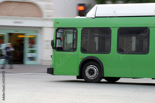 green bus on the street