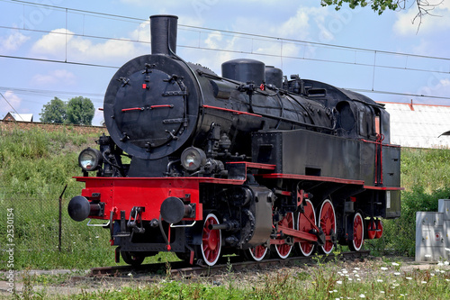 old steam engine at station