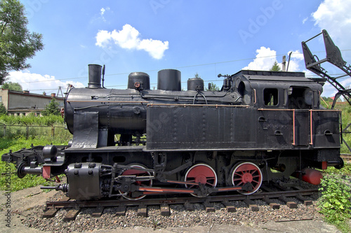 old steam engine at station