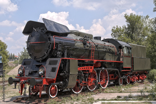 old steam engine at station