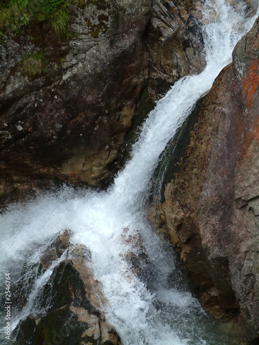 a small waterfall in the mountains