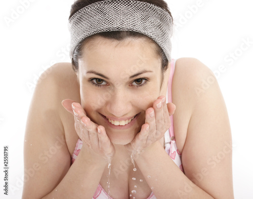 stock photo of woman washing her face