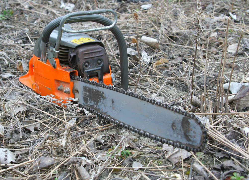 chainsaw on the ground