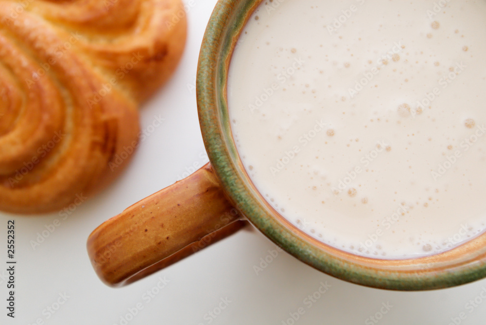 croissant and cup of sour milk