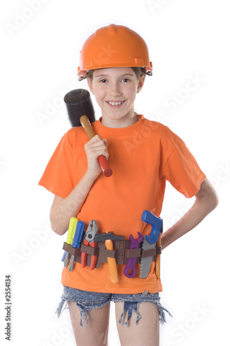the child in a helmet with tools on a white background