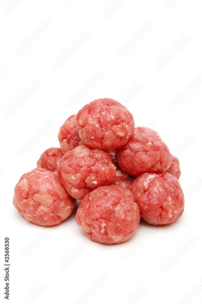 pyramid of raw meat-balls on white pyramid of raw meat-balls on white