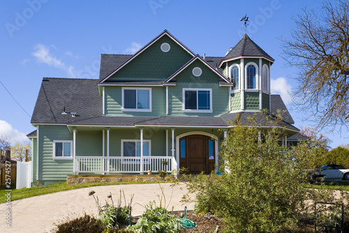 green victorian home