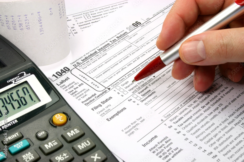 filling out tax form filling out tax form
